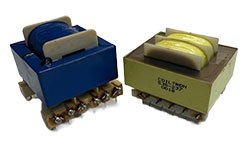 Two Coiltron PCB-mount transformers side-by-side: one with a blue housing and one yellow transformer labeled 535-277 with multiple mounting pins.