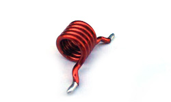Coiltron air core inductor with red insulated copper wire and custom-formed surface mount leads.