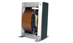 Industrial high voltage power transformer by Coiltron featuring a large brown winding coil and a heavy-duty metal lamination frame with mounting feet.